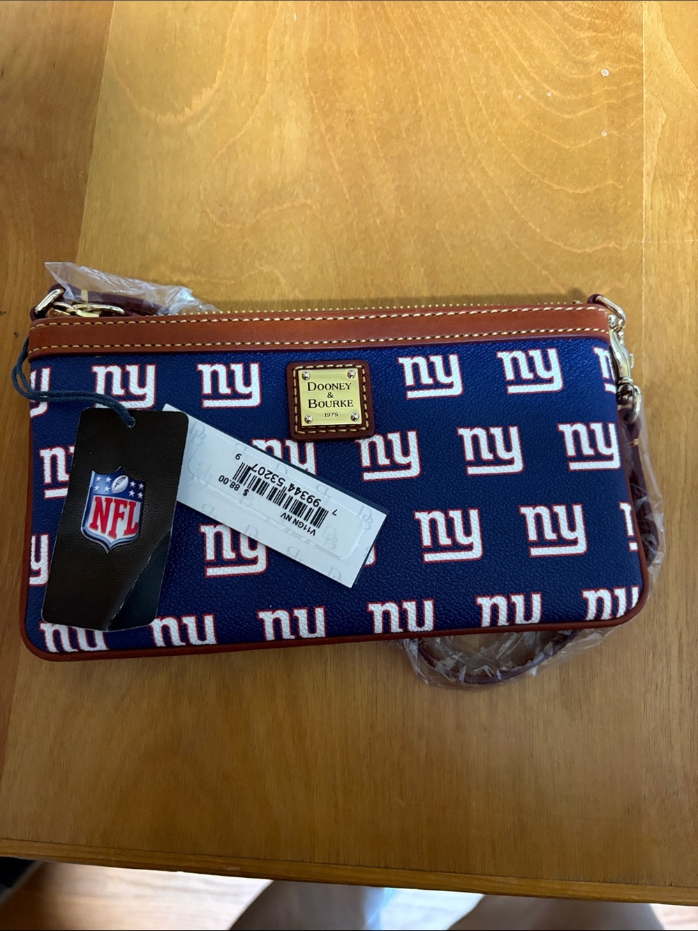 Dooney & Bourke Navy and White NY Logo Wristlet with Brown Trim